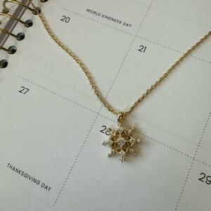 Elegant Gold Snowflake Pendant Necklace